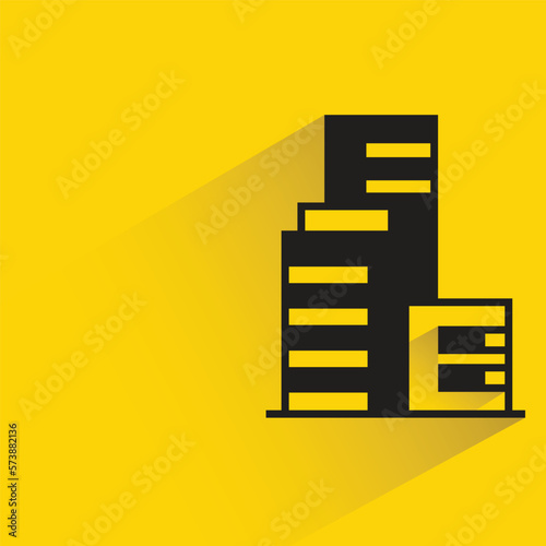office building with shadow on yellow background