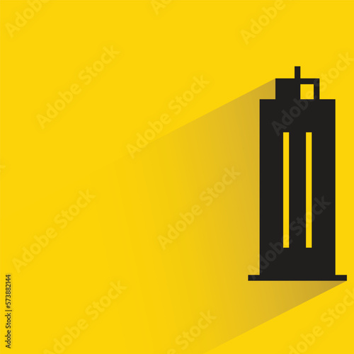 office building with shadow on yellow background