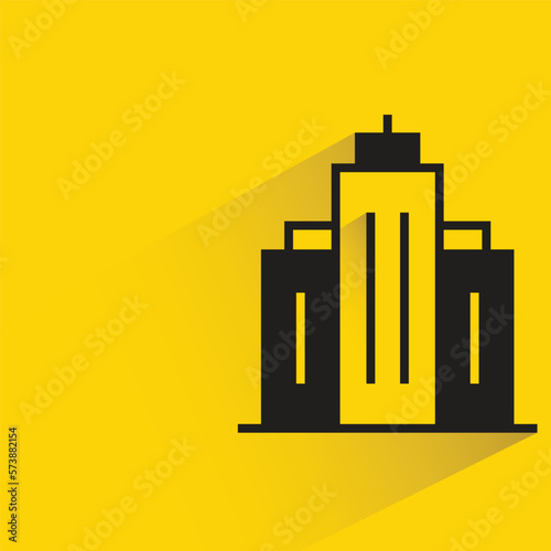 office building with shadow on yellow background