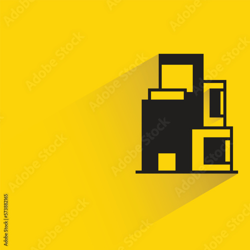 office building with shadow on yellow background