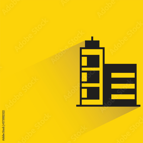 office building with shadow on yellow background