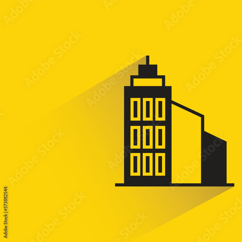 office building with shadow on yellow background