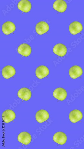 Wallpaper Mural Minimal motion design - Kiwi slices rotating and moving down at blue chroma key color background. Trendy colors and style graphics. Seamless looping vertical animation. Torontodigital.ca