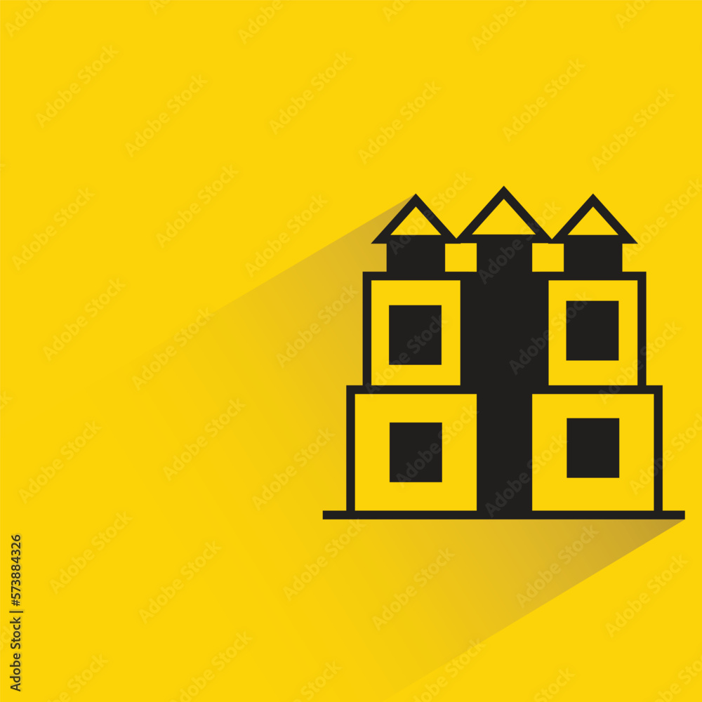 building with shadow on yellow background building with shadow on yellow background
