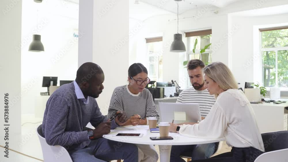 Business multi-ethnic team working together in a meeting. Business multi-ethnic team working together in a meeting.