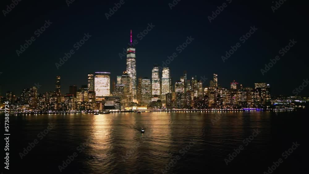 Flying along the waterfront of Manhattan New York City at night - drone photography Flying along the waterfront of Manhattan New York City at night - drone photography