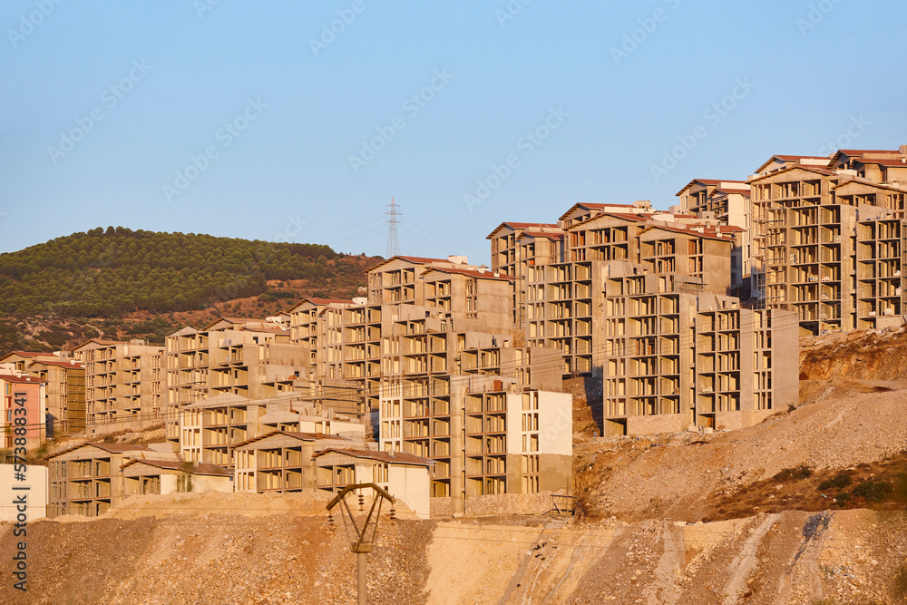 Fototapeta premium Building facades under construction. Work in progress. Development and investment