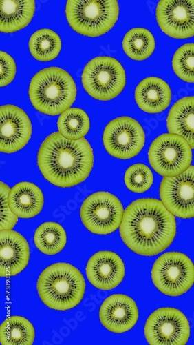 Wallpaper Mural Minimal motion design - Kiwi slices rotating at blue chroma key color background. Trendy colors and style graphics. Seamless looping vertical animation. Torontodigital.ca