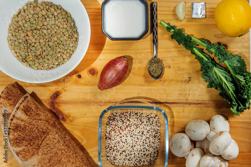 Raw ingredients. Ready to be cooked. Recipe for chiken stew, European cuisine, cooked with a garnish of mushrooms, small onions and ohter. photo