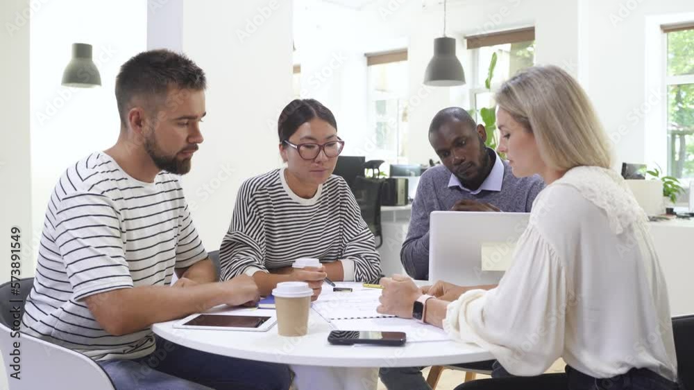 Business multi-ethnic team working together in a meeting. Business multi-ethnic team working together in a meeting.