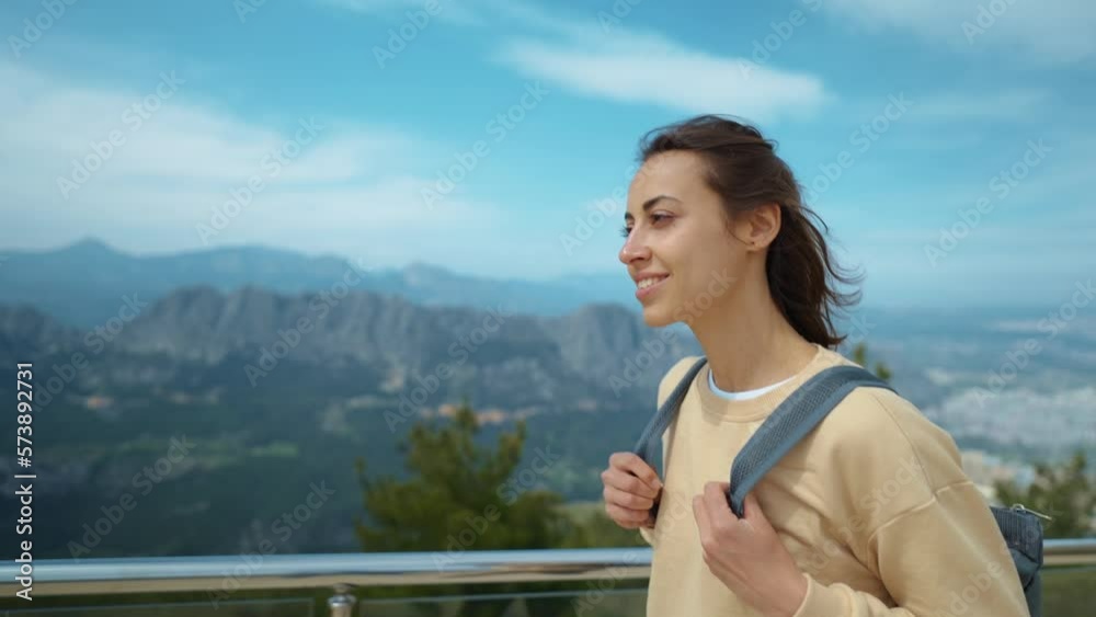 treking camera shot traveler freedom woman with backpack walking at view point on mountain top and enjoying mountains view, summer journey vacation. upper station of cable way in Antalya, Turkey treking camera shot traveler freedom woman with backpack walking at view point on mountain top and enjoying mountains view, summer journey vacation. upper station of cable way in Antalya, Turkey