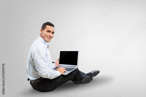 Young smart business man worker with laptop