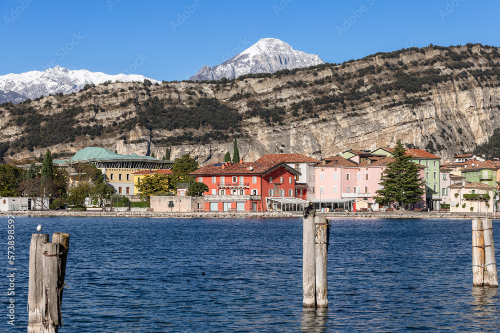 Embankment of the Riva del Garda town on Lake Garda in Italy on a sunny winter day
