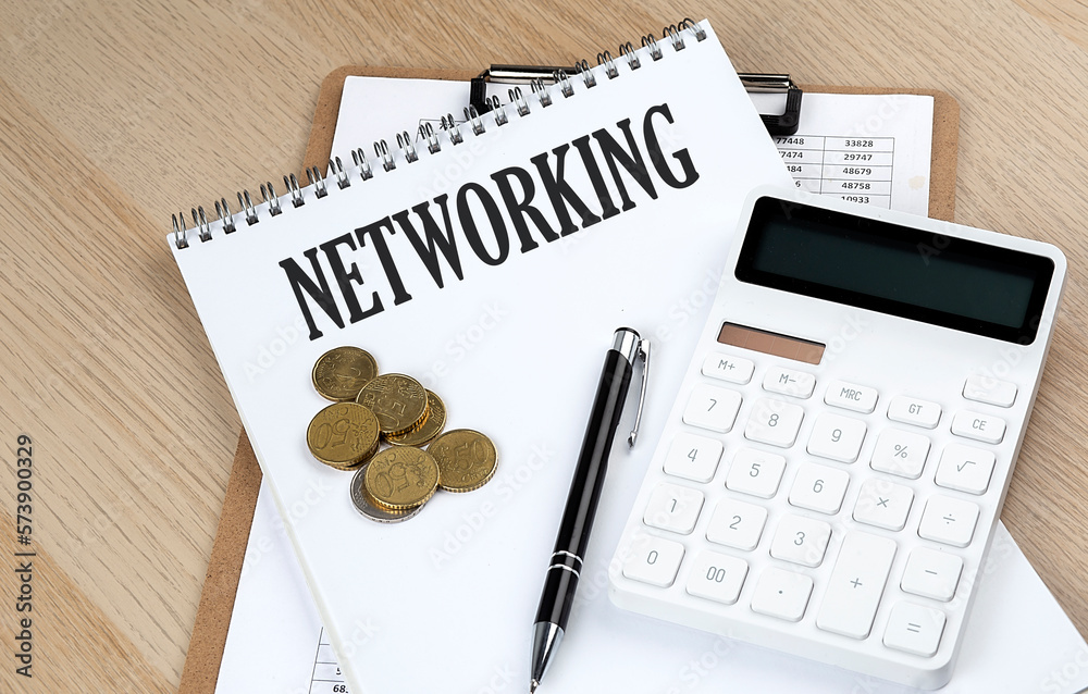 NETWORKING text with chart and calculator and coins , business concept NETWORKING text with chart and calculator and coins , business concept