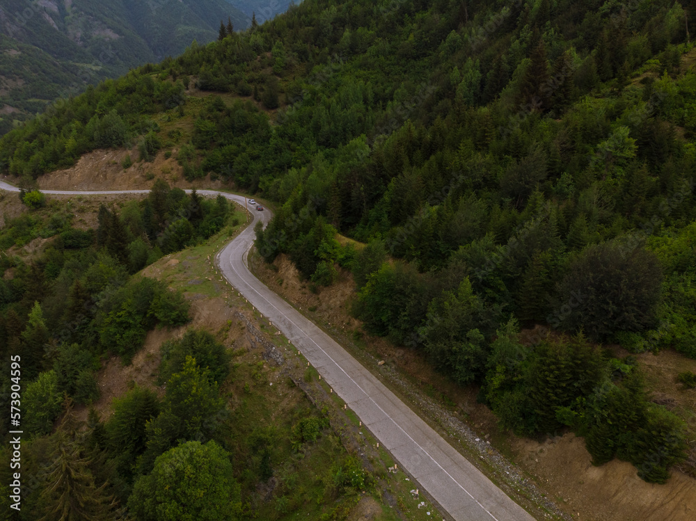 Summer mountain valley, beautifull road way to Mestia. Tsalanari, Hebudi, Georgia. Nature and car travel concept. Asphalt road among the mountains