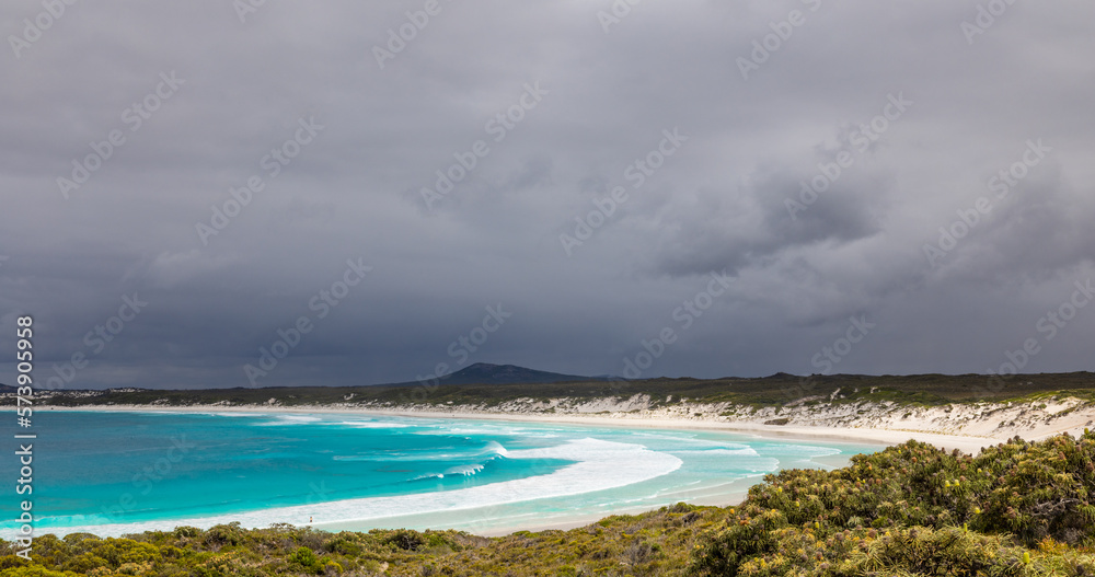 Upcoming thunder storm at turquoise Wharton Bay beach in the Esperance area of Western Australia