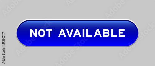 Blue color capsule shape button with word not available on gray background