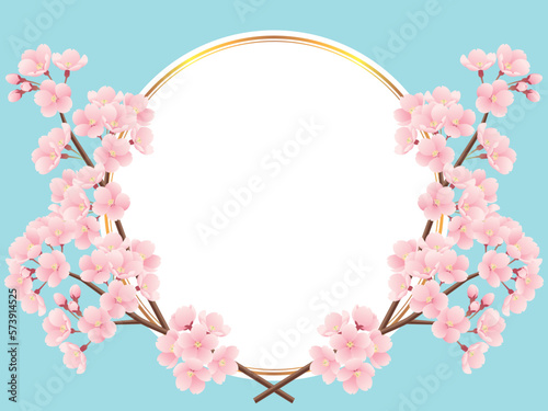 交差した桜の枝と金色ラインの丸フレームのイラスト（水色）