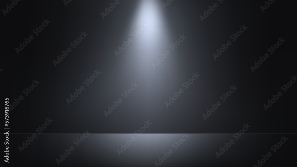 Black studio background with spotlight