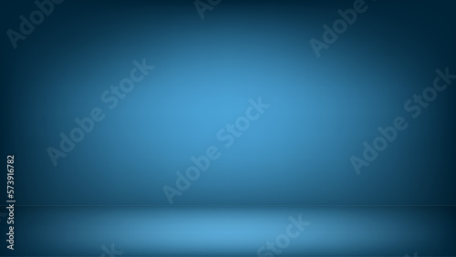 Dark blue studio background with spot lighting