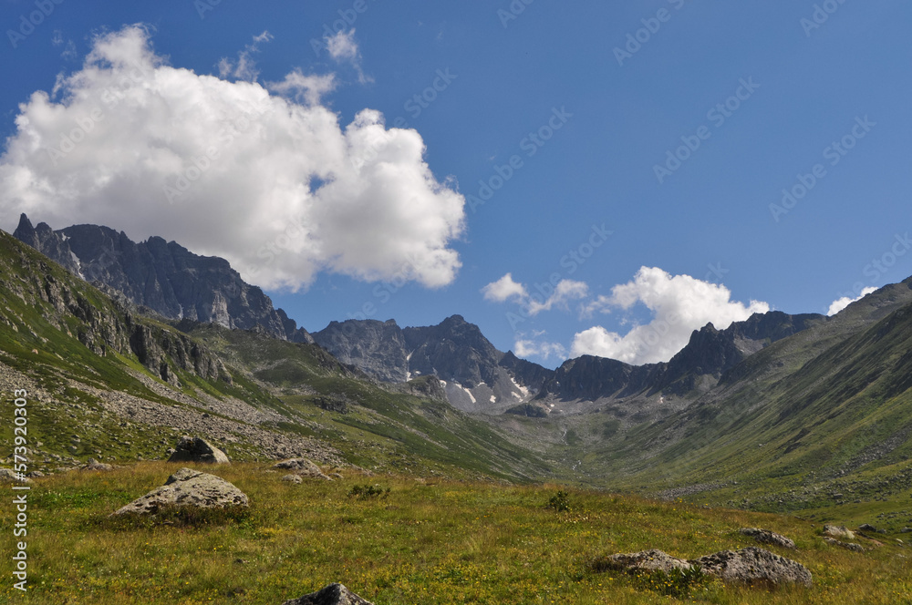 Mountain landscape, mountain landscape covered with green grass and blue sky