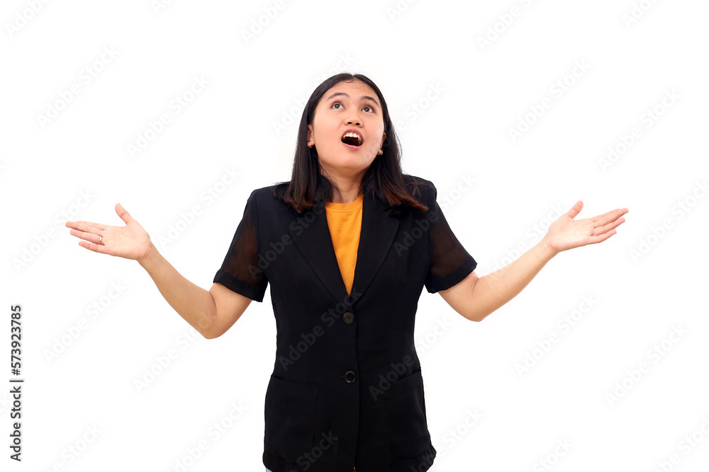 Wow and surprised expression of young asian business standing while getting something from above Wow and surprised expression of young asian business standing while getting something from above