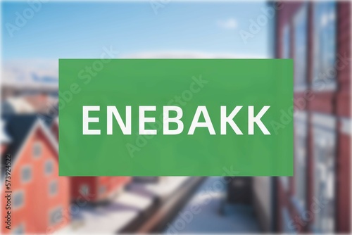 Enebakk: Der Name der norwegischen Stadt Enebakk in der Region Akershus vor einem Hintergrundfoto photo