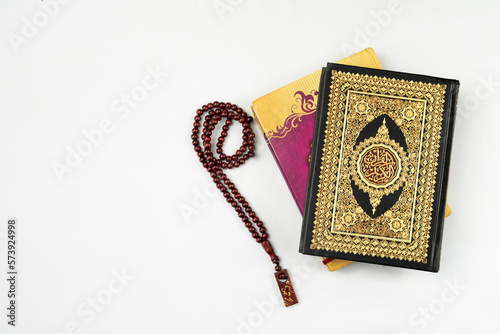 Stack of holy Quran book isolated for copy space
