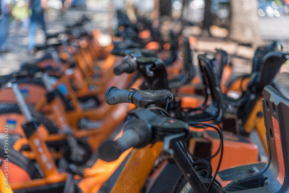 Bicycle rental in the city. Differentiated focus in the foreground