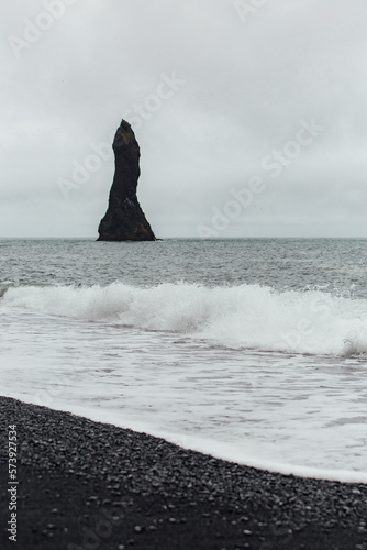 rock formation by the black sand