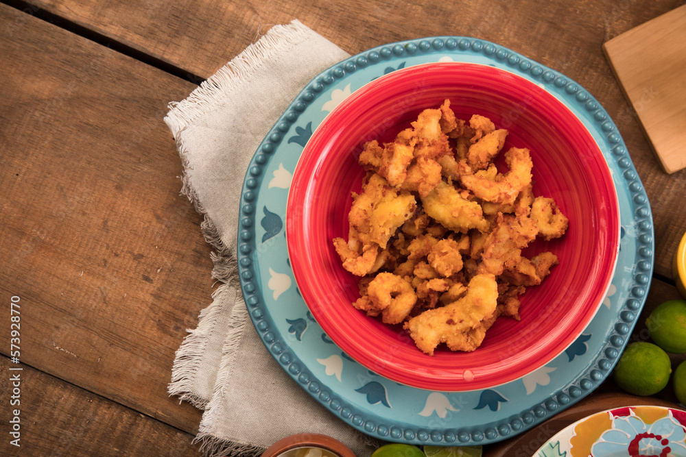 Chicharrón de pota pescado fish sticks Sea food ceviche Assorted food