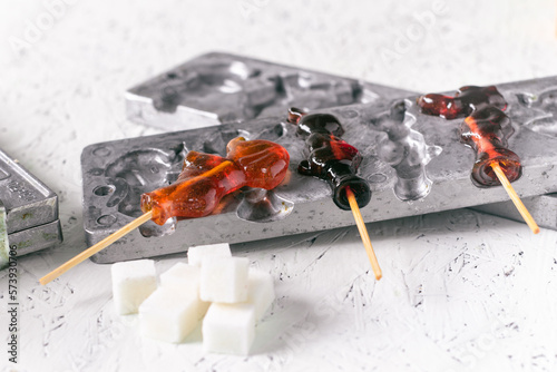 Lollipops on a stick. Candy on a white background. Homemade sweets