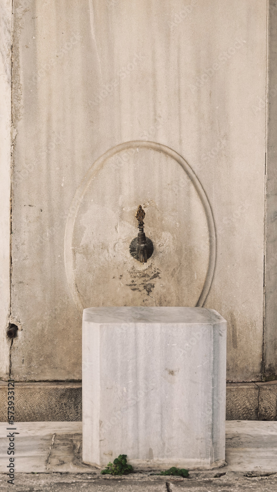 A historical public ablution Ottoman Mosque. Close Up View of Ablution Fountains and stools. Ramadan prayer background. A historical public ablution Ottoman Mosque. Close Up View of Ablution Fountains and stools. Ramadan prayer background.