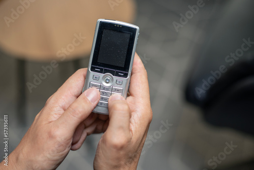 Wallpaper Mural Thumb texting with old retro phone Torontodigital.ca