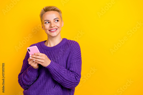 Murais de parede Photo of wearing purple knitted jumper short blonde hair lady browsing informati