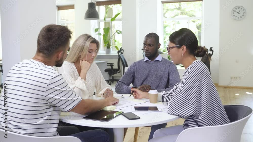 Business multi-ethnic team working together in a meeting. Business multi-ethnic team working together in a meeting.