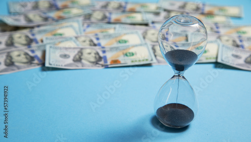 Hourglass and dollar. Time is money