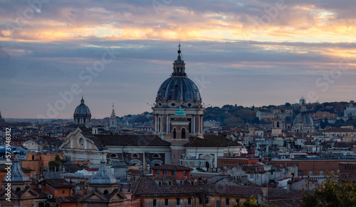 Old Historic Buildings in Downtown City of Rome, Italy. Cloudy Sunny Sunset Sky.