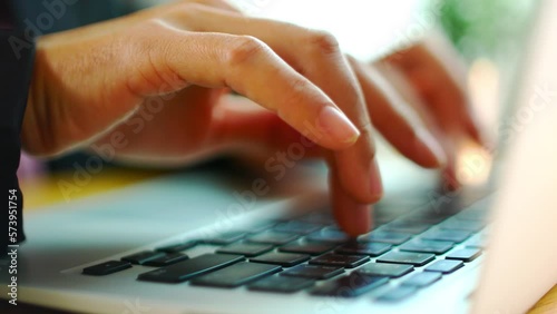 Close-up of hands typing on laptop keyboard stock footage, Working from home.