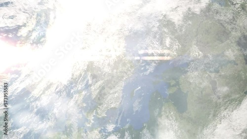 Earth zoom in from outer space to city. Zooming on Enkoping, Sweden. The animation continues by zoom out through clouds and atmosphere into space. Images from NASA photo