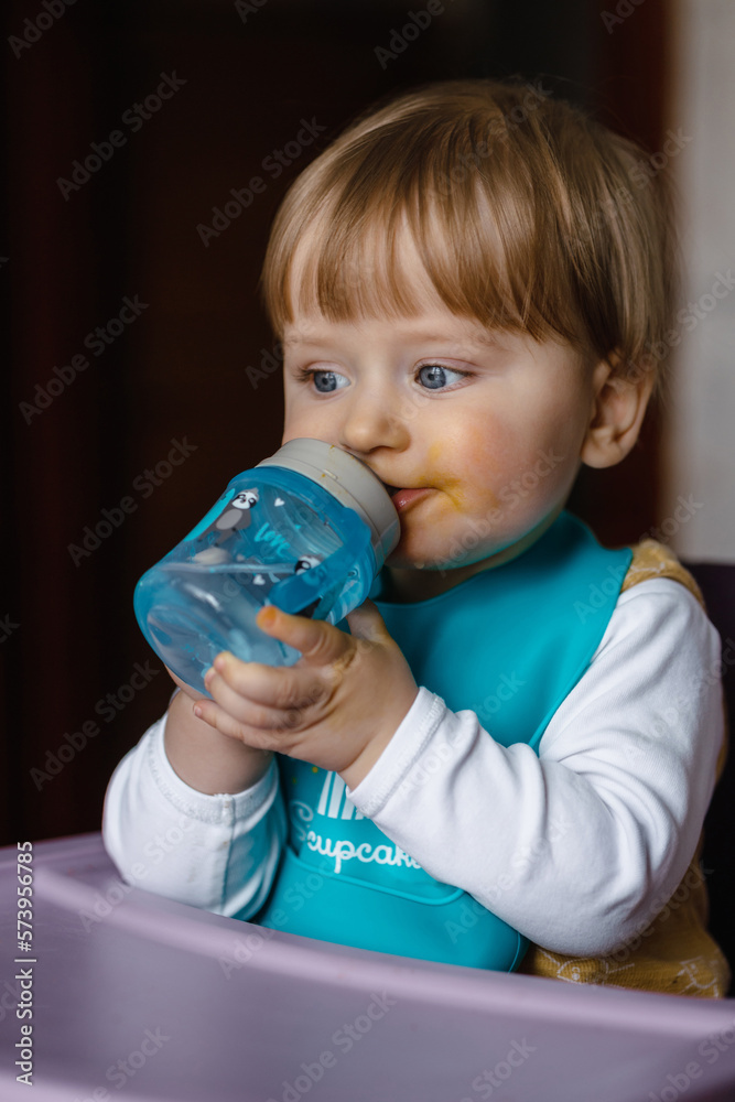 baby child drinking water, baby drinks water from bottle. baby child drinking water, baby drinks water from bottle.
