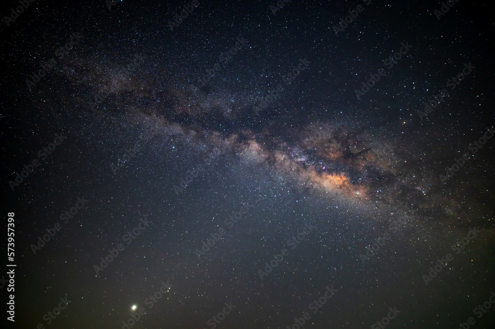 Many stars , view universe space shot of milky way galaxy with stars on a night sky background. The Milky Way is the galaxy that contains our Solar System.