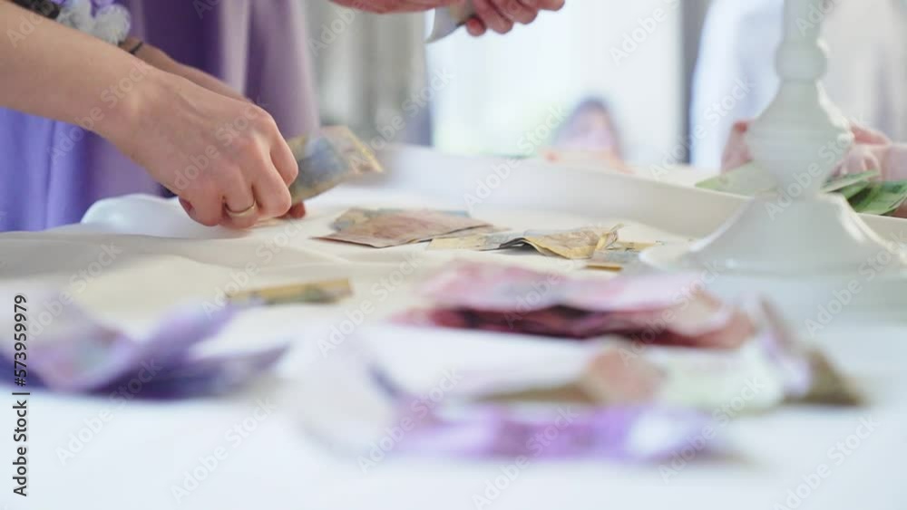 Counting euro and dollar cash money in female hands on the table. Counting euro and dollar cash money in female hands on the table.