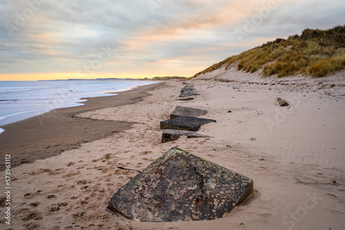 Fototapeta Naklejka Na Ścianę i Meble -  Druridge Bay Wartime Beach Defences, located on the North Sea in Northumberland's AONB in England, it is a 7 miles long bay between Amble and Cresswell