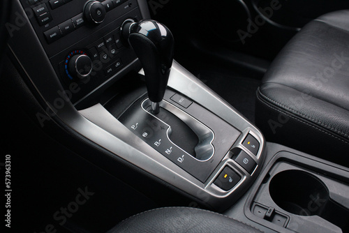 Close up of the automatic gearbox lever, Automatic transmission gearshift stick. Closeup a manual shift of modern car gear shifter.