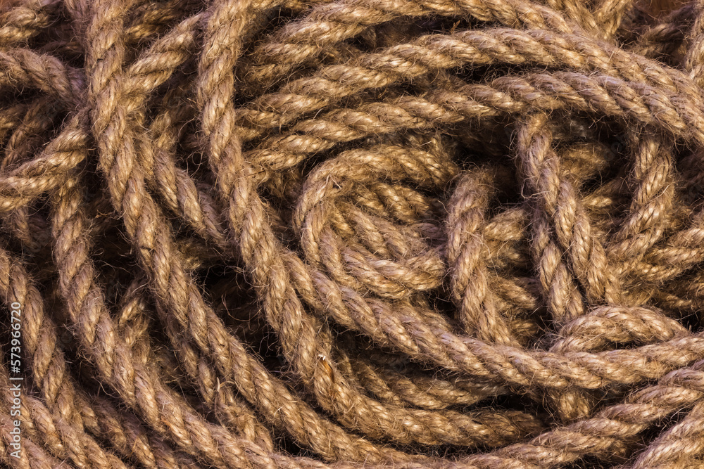 Abstract ropes, cables, hems background, Tangled rope rope background. Jute rope. Shot up close