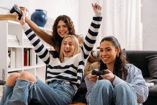 Caucasian woman is excited after winning in the game