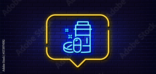 Neon light speech bubble. Medical drugs bottle line icon. Medicine pills sign. Pharmacy medication symbol. Neon light background. Medical drugs glow line. Brick wall banner. Vector