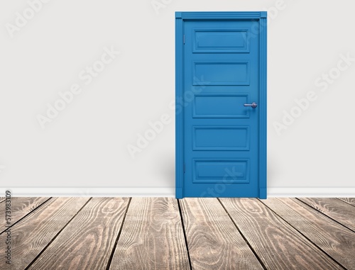 Retro wooden blue door on background