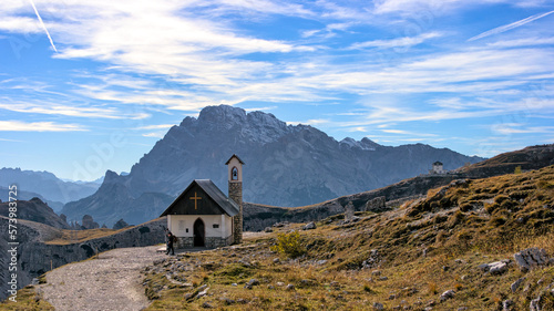 Chapel on a hikingtrail in the Dolomites in Italy photo